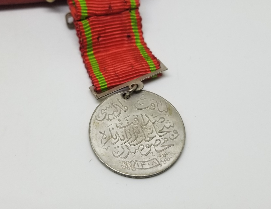 ORİJİNAL KUTUSUNDA ÇOK NADİR KILIÇLI LİYAKAT MADALYASI