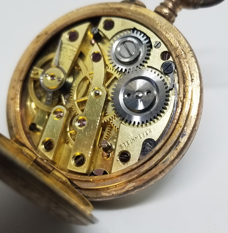 KABARTMA İŞÇİLİKLİ NADİR TİPTE ANTİKA ALTIN CEP SAATİ