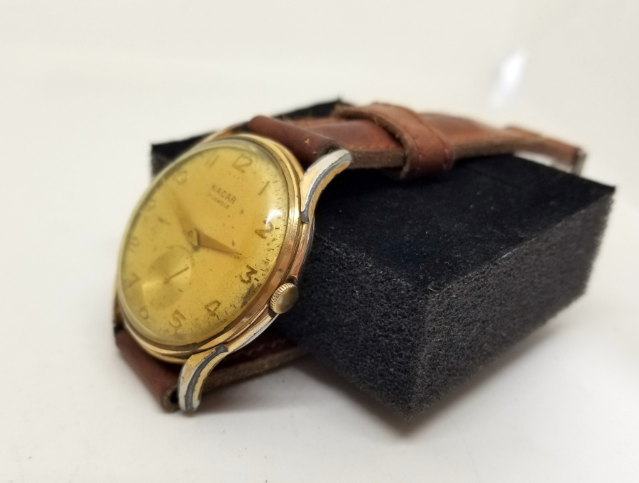 ALTIN KAPLAMA ANTİKA KURMALI NACAR KOL SAATİ