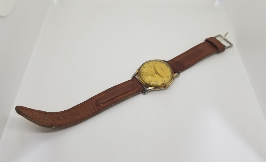 ALTIN KAPLAMA ANTİKA KURMALI NACAR KOL SAATİ