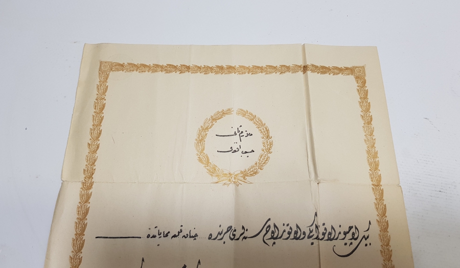 1. DÜNYA SAVAŞI DÖNEMİ ÇANAKKALE CEPHESİNDE GAZİ OLMUŞ BİR TOPÇUMUZA AİT HARP MADALYASI BERATI