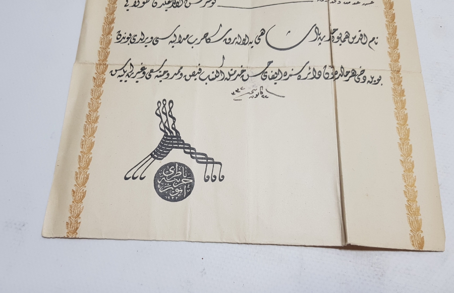 1. DÜNYA SAVAŞI DÖNEMİ ÇANAKKALE CEPHESİNDE GAZİ OLMUŞ BİR TOPÇUMUZA AİT HARP MADALYASI BERATI