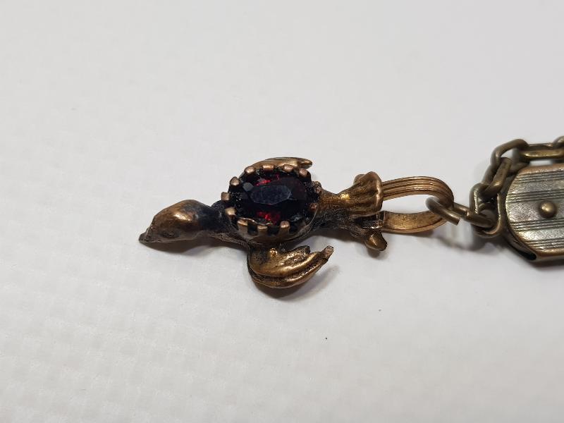ANTİKA LAL TAŞLI KUŞ APLİKLİ SAAT KÖSTEĞİ