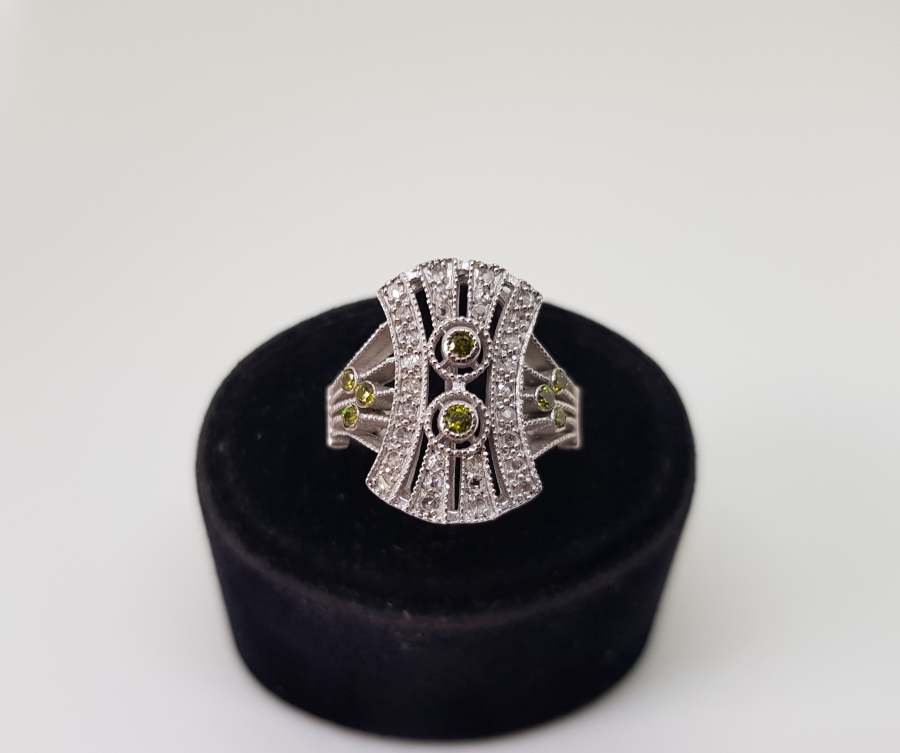 PIRLANTA VE SİTRİN TAŞLI EĞRİ BAGET MODEL YÜZÜK