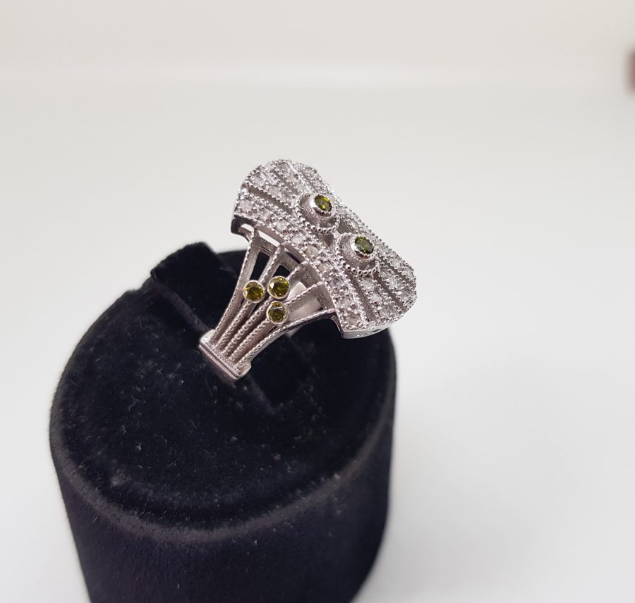 PIRLANTA VE SİTRİN TAŞLI EĞRİ BAGET MODEL YÜZÜK