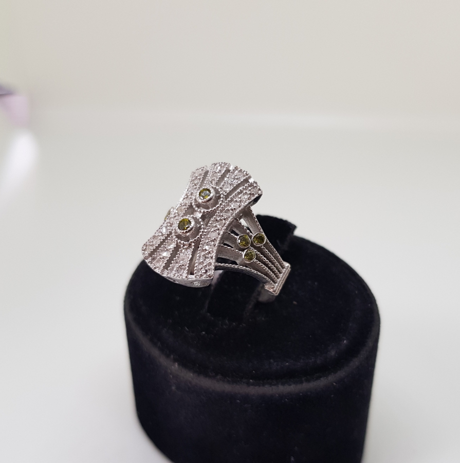 PIRLANTA VE SİTRİN TAŞLI EĞRİ BAGET MODEL YÜZÜK