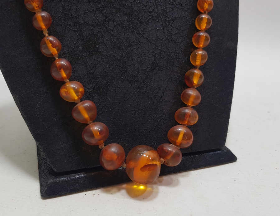 İÇERİSİNDE BİTKİ FOSİLLERİ BULUNAN ÖZEL YAPIM ANTİKA DAMLA KEHRİBAR GERDANLIK