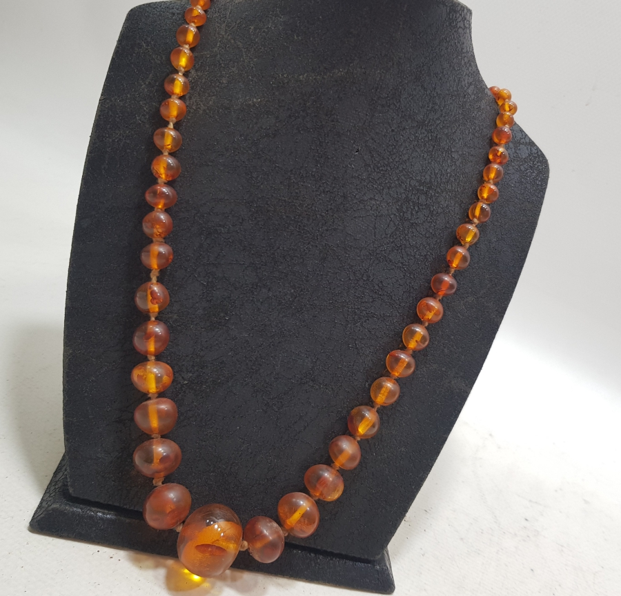 İÇERİSİNDE BİTKİ FOSİLLERİ BULUNAN ÖZEL YAPIM ANTİKA DAMLA KEHRİBAR GERDANLIK