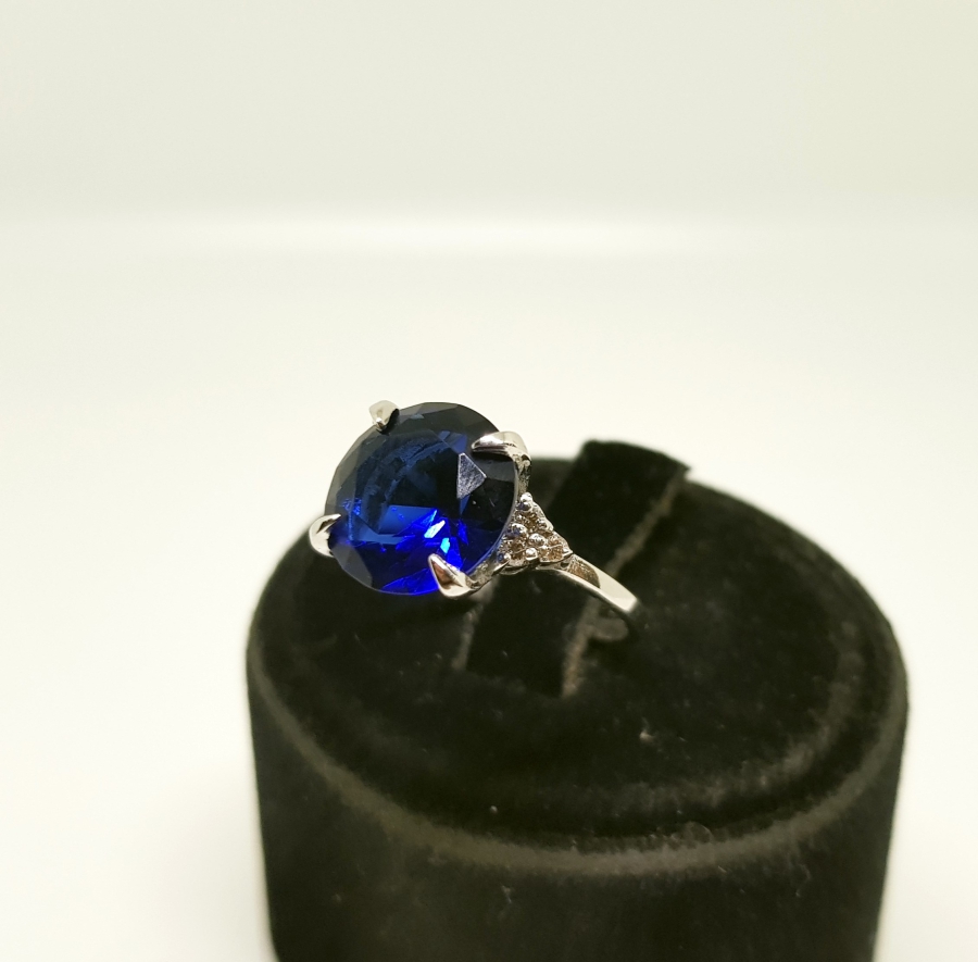 SAFİR VE PIRLANTA TAŞLI KARTAL PENÇESİ MODELİ YÜZÜK