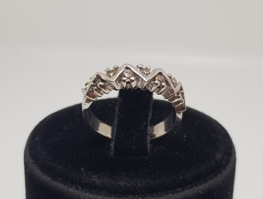 DALGALI ÇİFTE BEŞTAŞ MODEL PIRLANTA TAŞLI YÜZÜK