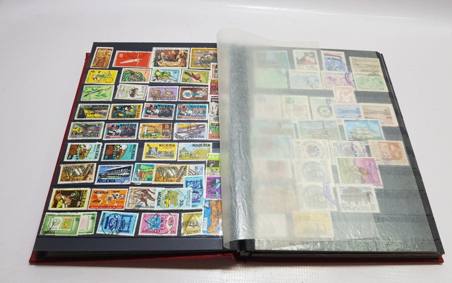 ÇEŞİTLİ MİLLETLERE AİT PULLAR BULUNAN ANTİKA PUL ALBÜMÜ