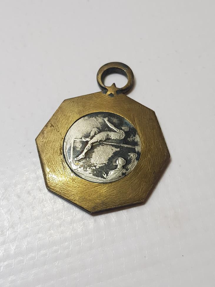 TÜRKİYE İDMAN CEMİYETLERİ İTTİFAKI YÜKSEK ATLAMA MADALYASI