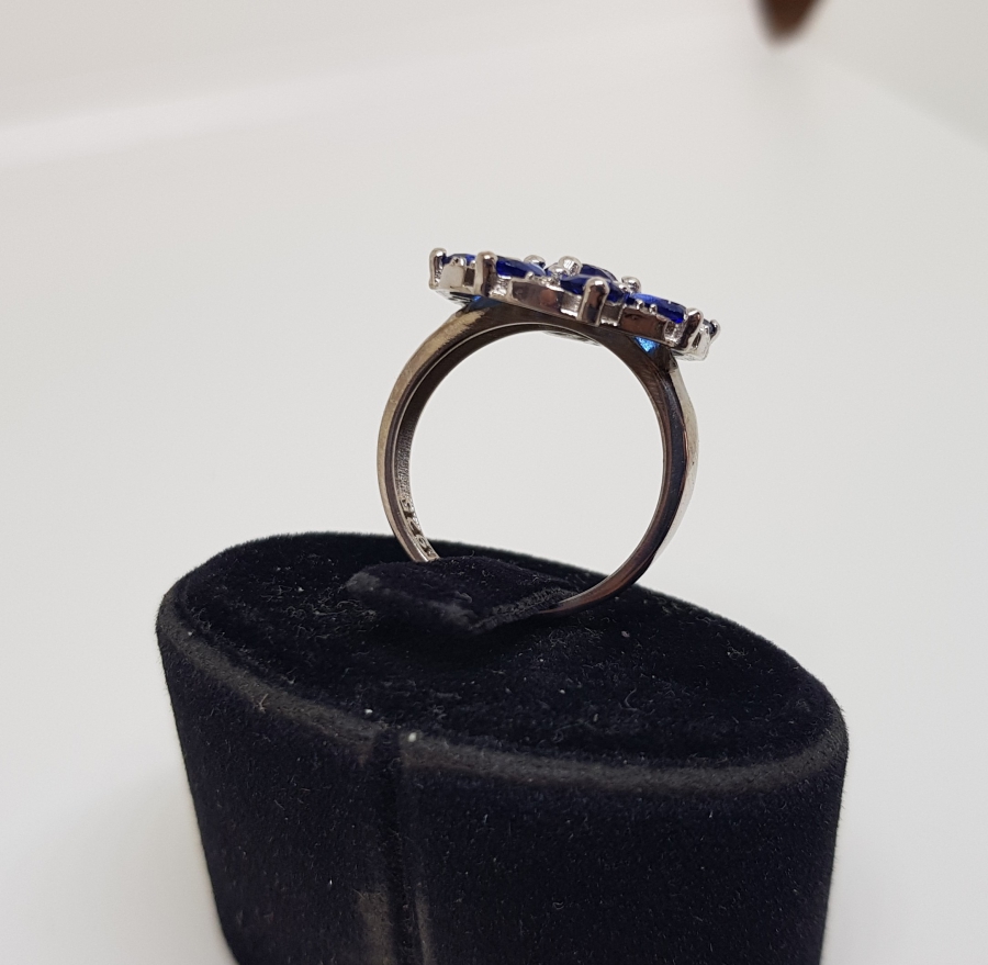 SAFİR VE PIRLANTA TAŞLI GÜNEŞ MODELİ YÜZÜK