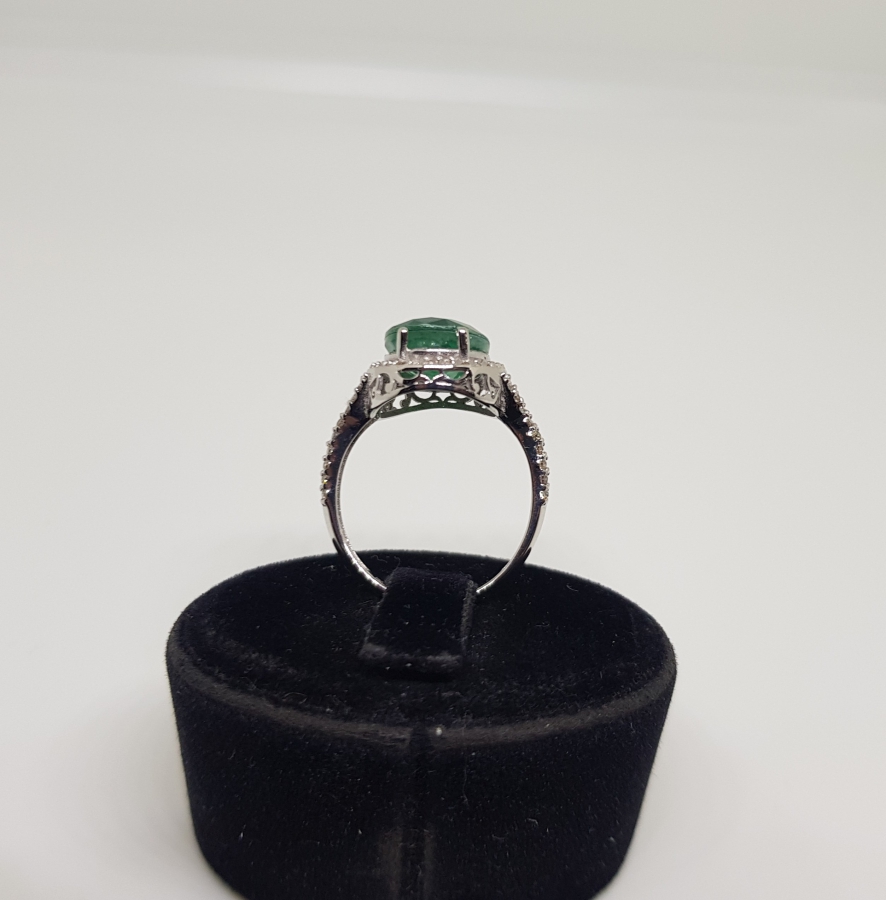 PIRLANTA VE ZÜMRÜT TAŞLI FLEMENK KESİMLİ YÜZÜK