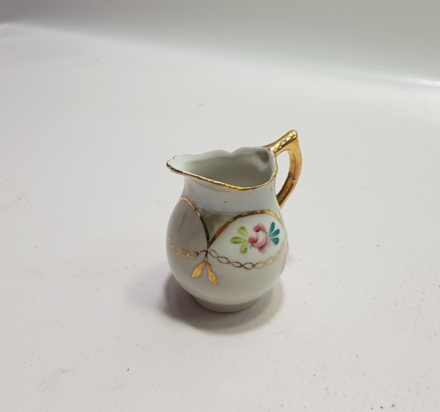 ANTİKA PORSELEN SÜTLÜK