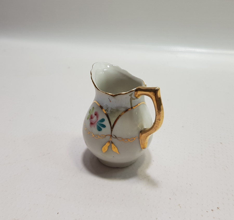 ANTİKA PORSELEN SÜTLÜK