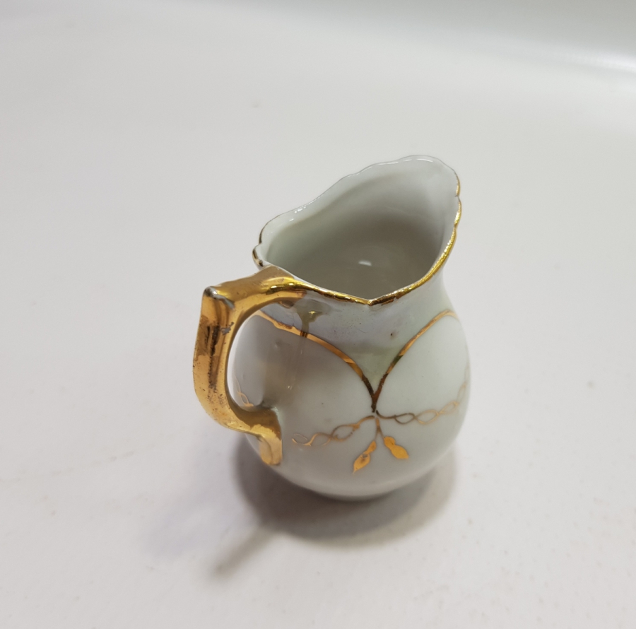 ANTİKA PORSELEN SÜTLÜK