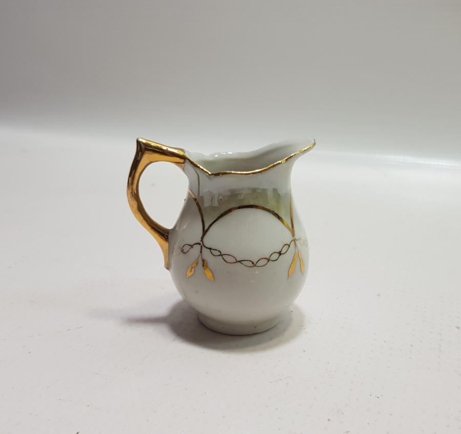 ANTİKA PORSELEN SÜTLÜK