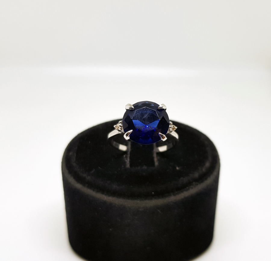 SAFİR VE PIRLANTA TAŞLI KARTAL PENÇESİ MODELİ YÜZÜK