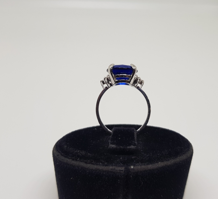 SAFİR VE PIRLANTA TAŞLI KARTAL PENÇESİ MODELİ YÜZÜK