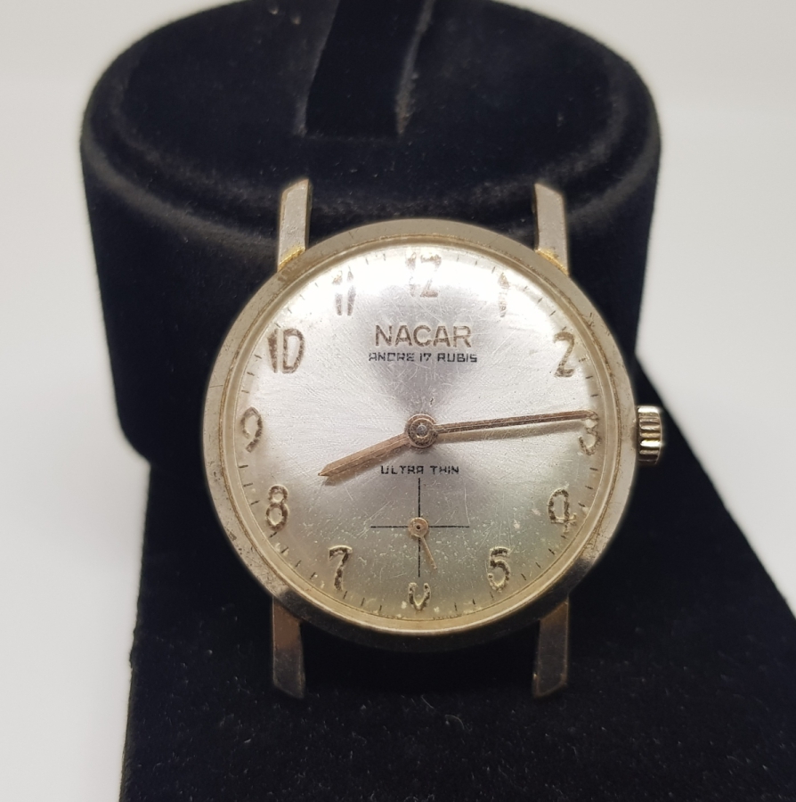 NADİR FORMDA ULTRATHİN KURMALI NACAR ALTIN KAPLAMA KOL SAATİ