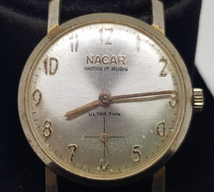 NADİR FORMDA ULTRATHİN KURMALI NACAR ALTIN KAPLAMA KOL SAATİ