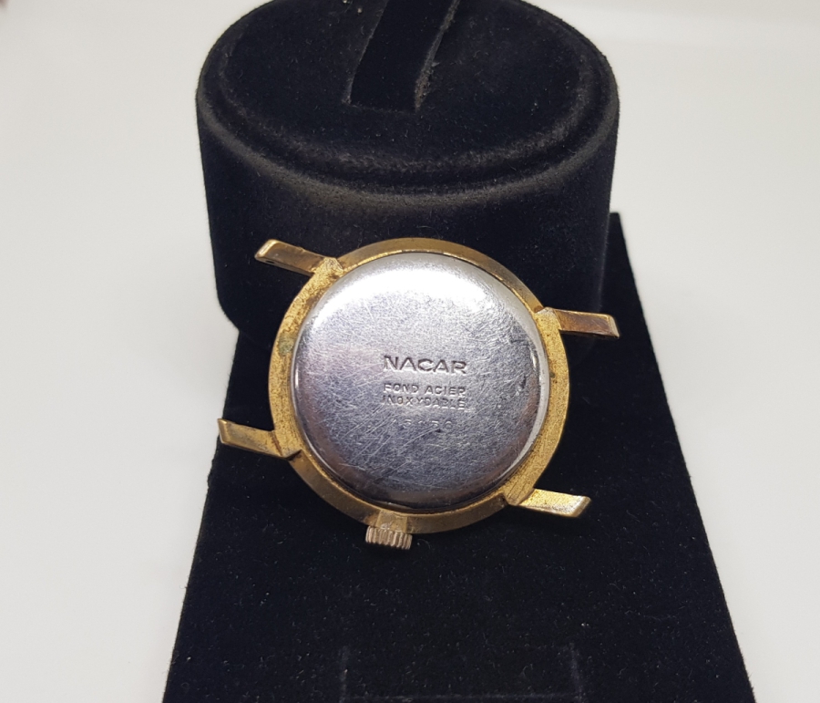 NADİR FORMDA ULTRATHİN KURMALI NACAR ALTIN KAPLAMA KOL SAATİ