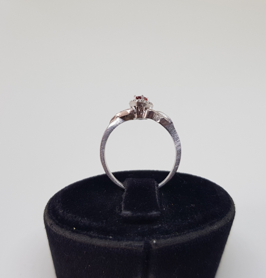 ZÜMRÜT VE PIRLANTA TAŞLI SONSUZLUK MODELİ ÖZEL YAPIM YÜZÜK