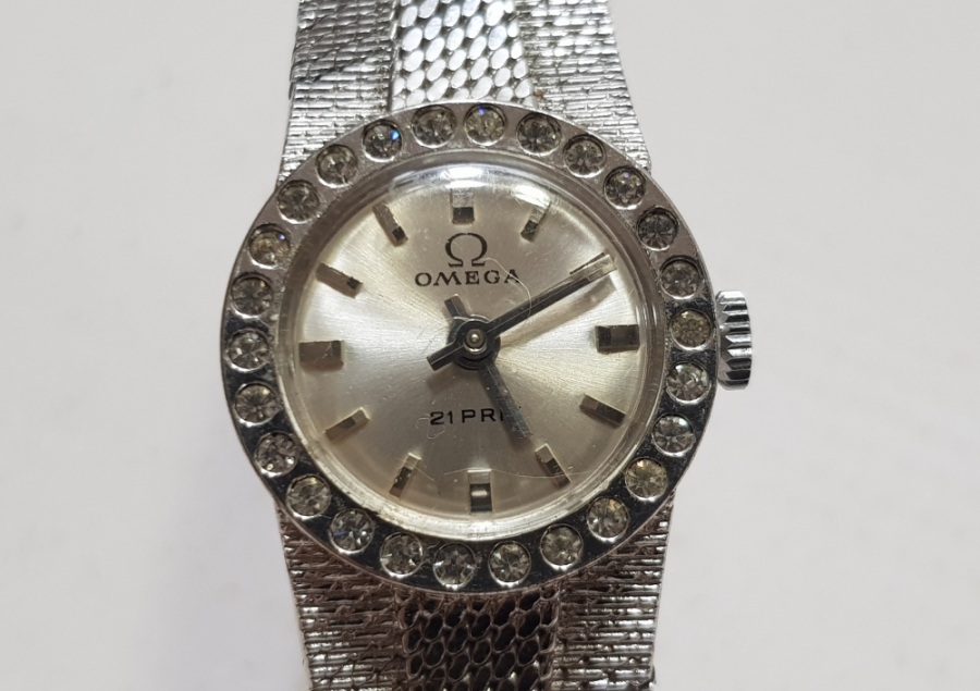 OMEGA MARKA KURMALI ANTİKA KOL SAATİ