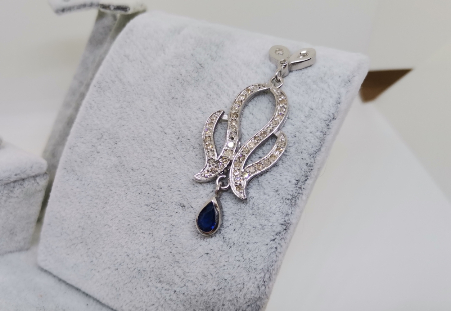 SAFİR VE PIRLANTA TAŞLI SONSUZLUK MODEL KOLYE