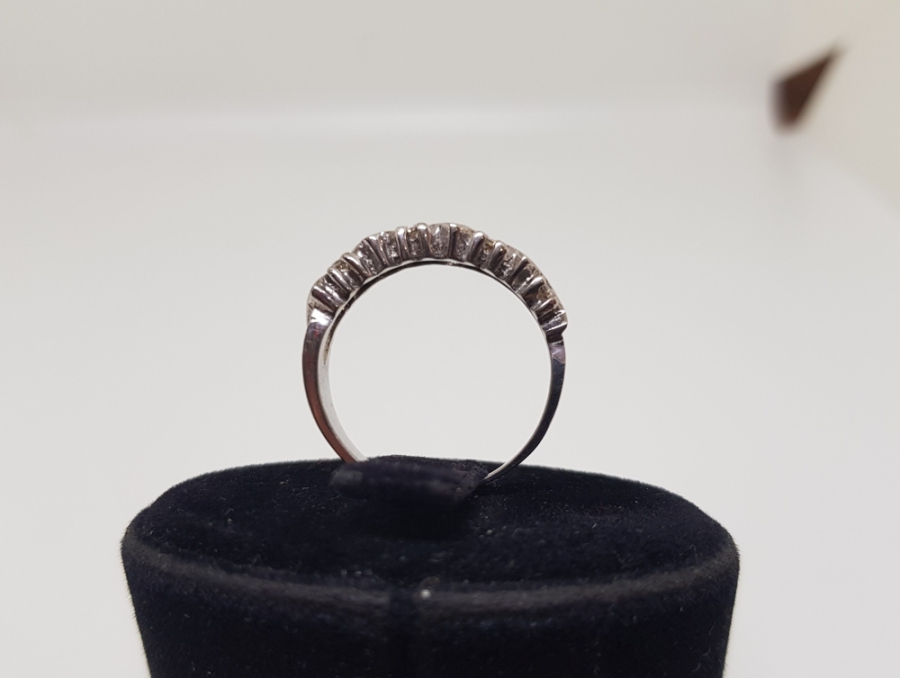 DALGALI ÇİFTE BEŞTAŞ MODEL PIRLANTA TAŞLI YÜZÜK