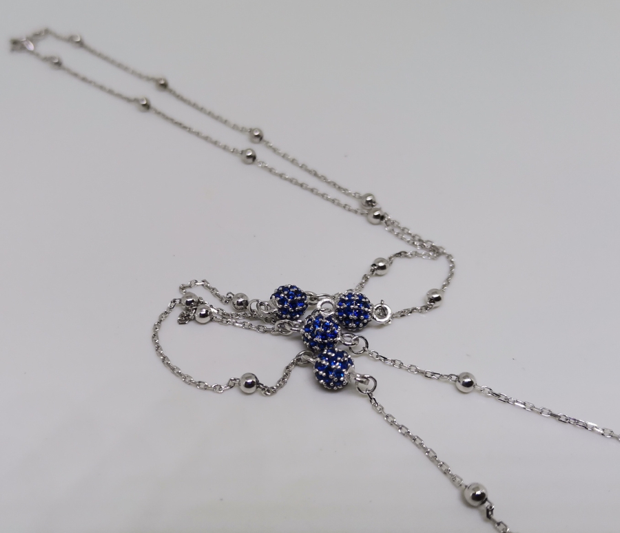 PIRLANTA VE SAFİR TAŞLI NAZAR BONCUĞU FORMLU KOLYE