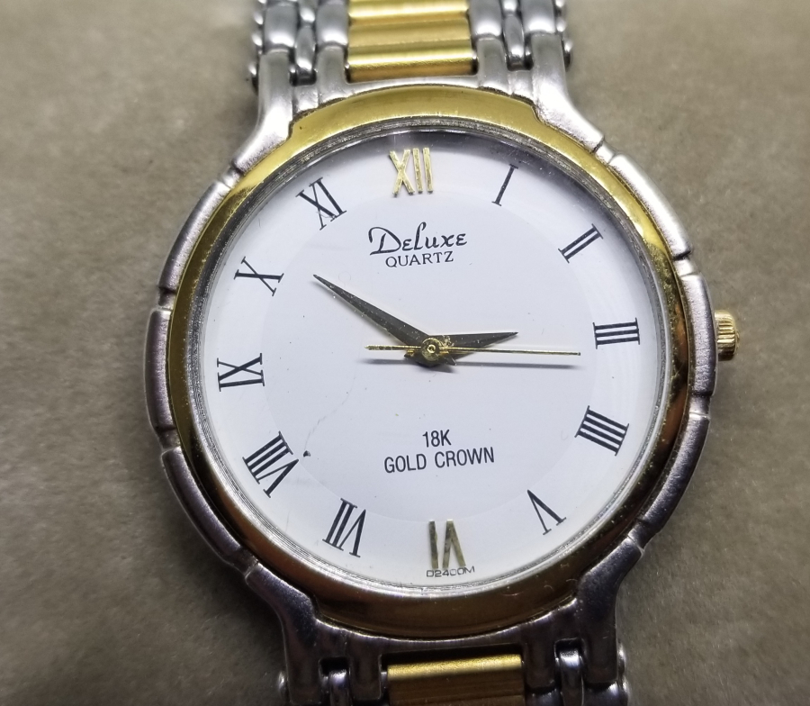 DELUXE MARKA ALTIN KAPLAMA PİLLİ KOL SAATİ