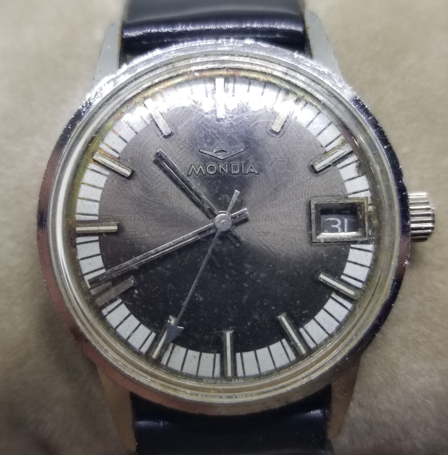 MONDIA MARKA KURMALI TAKVİMLİ ANTİKA KOL SAATİ