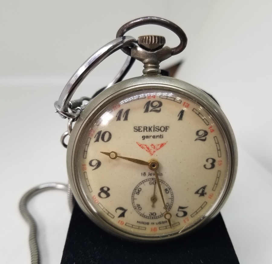 ORİJİNAL KÖSTEĞİYLE ARKASI TRENLİ SERKİSOF MARKA KURMALI CEP SAATİ