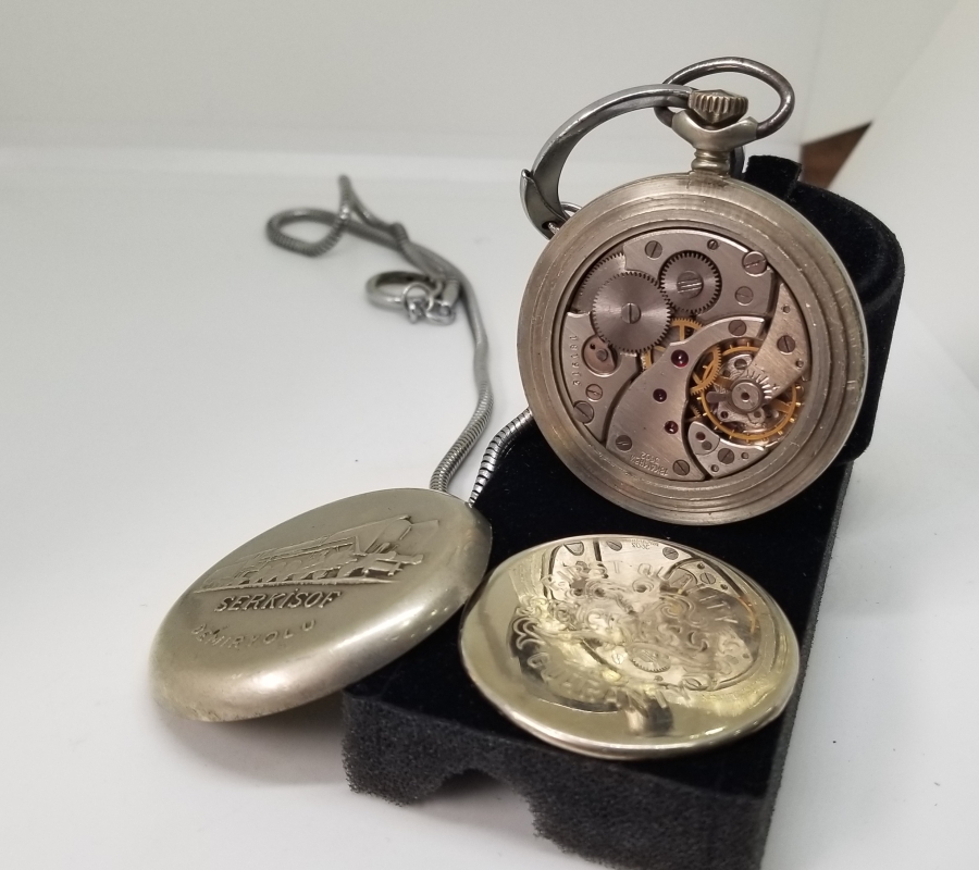 ORİJİNAL KÖSTEĞİYLE ARKASI TRENLİ SERKİSOF MARKA KURMALI CEP SAATİ