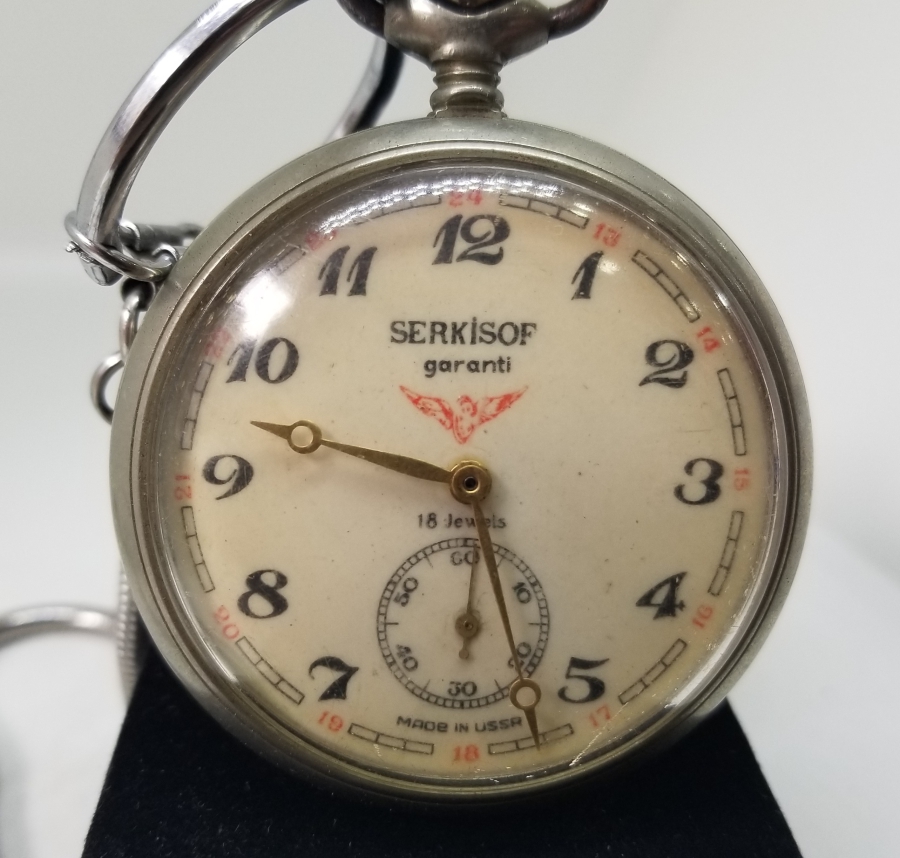 ORİJİNAL KÖSTEĞİYLE ARKASI TRENLİ SERKİSOF MARKA KURMALI CEP SAATİ