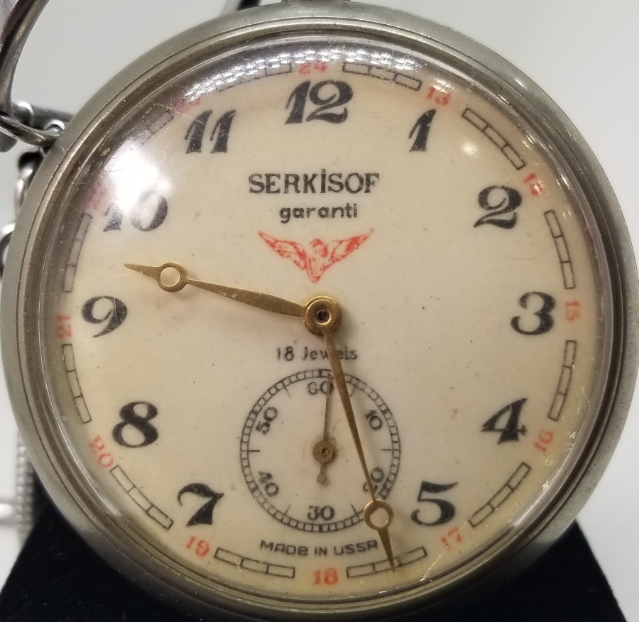 ORİJİNAL KÖSTEĞİYLE ARKASI TRENLİ SERKİSOF MARKA KURMALI CEP SAATİ