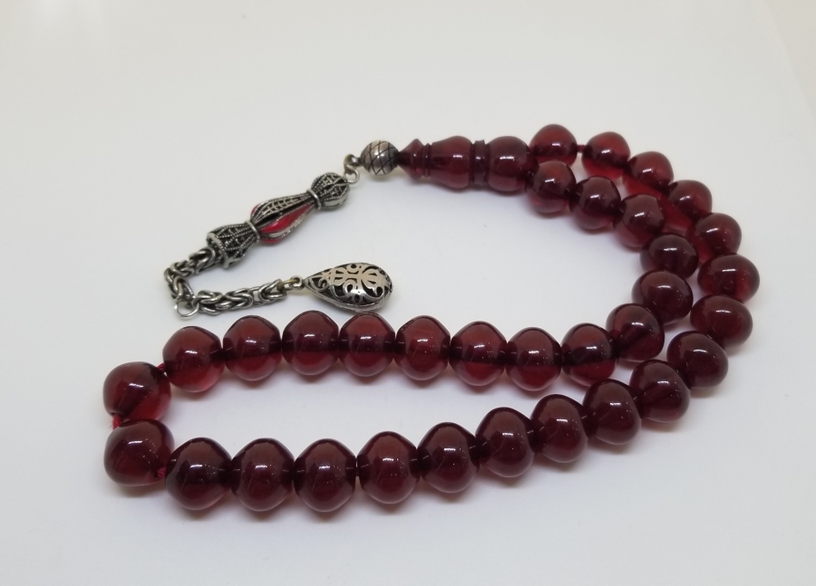 ÇUBUK PARÇADAN YAPILMIŞ GÜMÜŞ PÜSKÜLLÜ SIKMA KEHRİBAR TESPİH