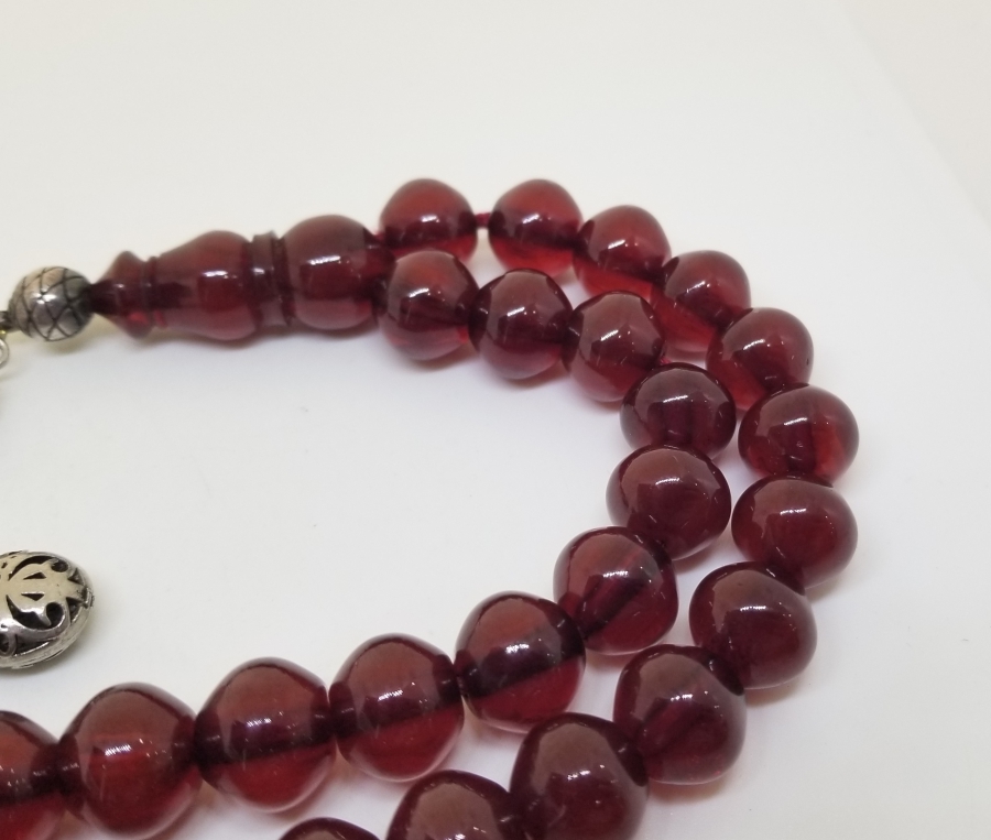 ÇUBUK PARÇADAN YAPILMIŞ GÜMÜŞ PÜSKÜLLÜ SIKMA KEHRİBAR TESPİH