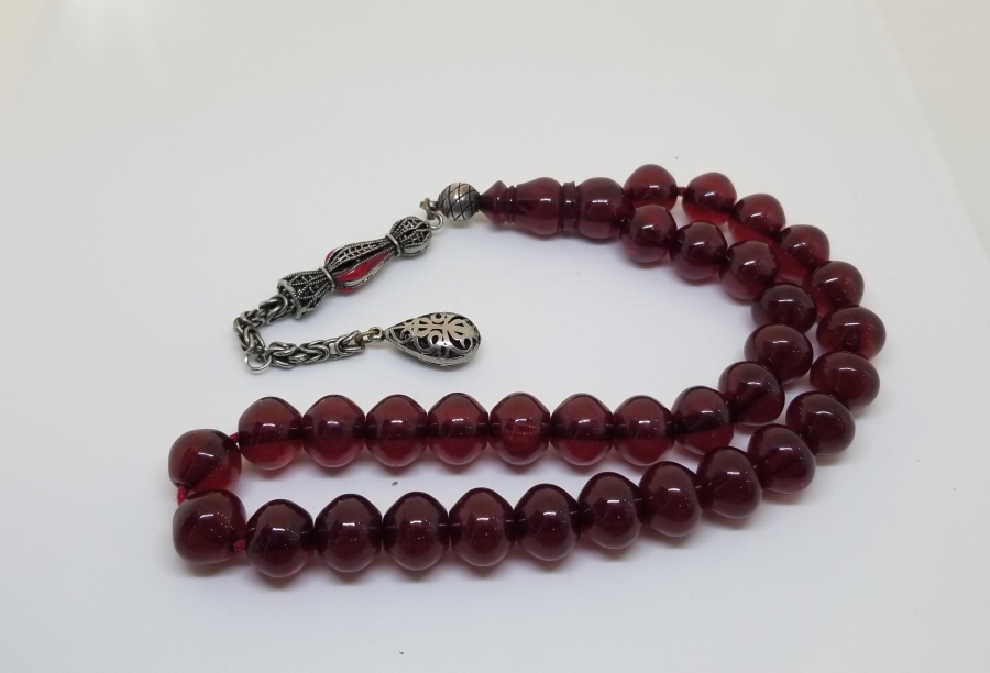 ÇUBUK PARÇADAN YAPILMIŞ GÜMÜŞ PÜSKÜLLÜ SIKMA KEHRİBAR TESPİH