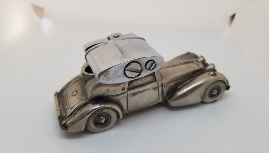 KLASİK ARABA FORMUNDA YAPILMIŞ ANTİKA MASA ÇAKMAĞI