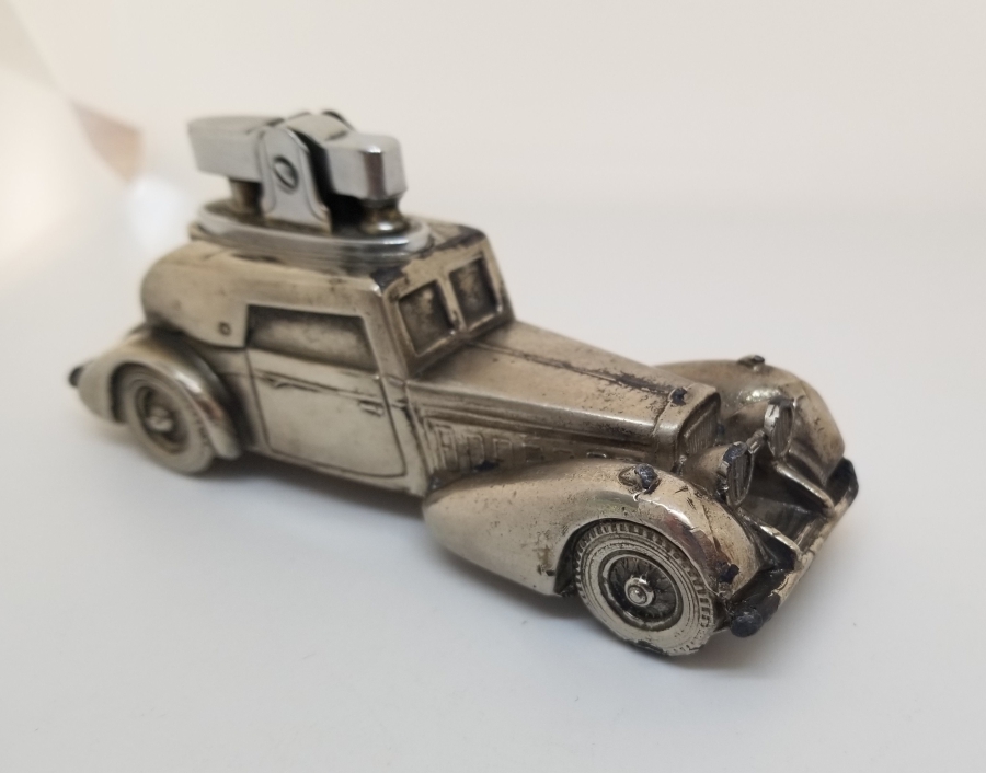 KLASİK ARABA FORMUNDA YAPILMIŞ ANTİKA MASA ÇAKMAĞI