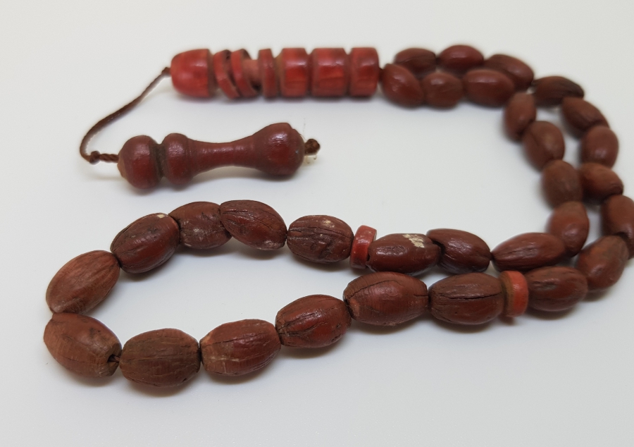 OSMANLI DÖNEMİ ZEYTİN ÇEKİRDEĞİNDEN YAPILMIŞ İMAMESİ MEVLEVİ SİKKESİ FORMUNDA TESPİH