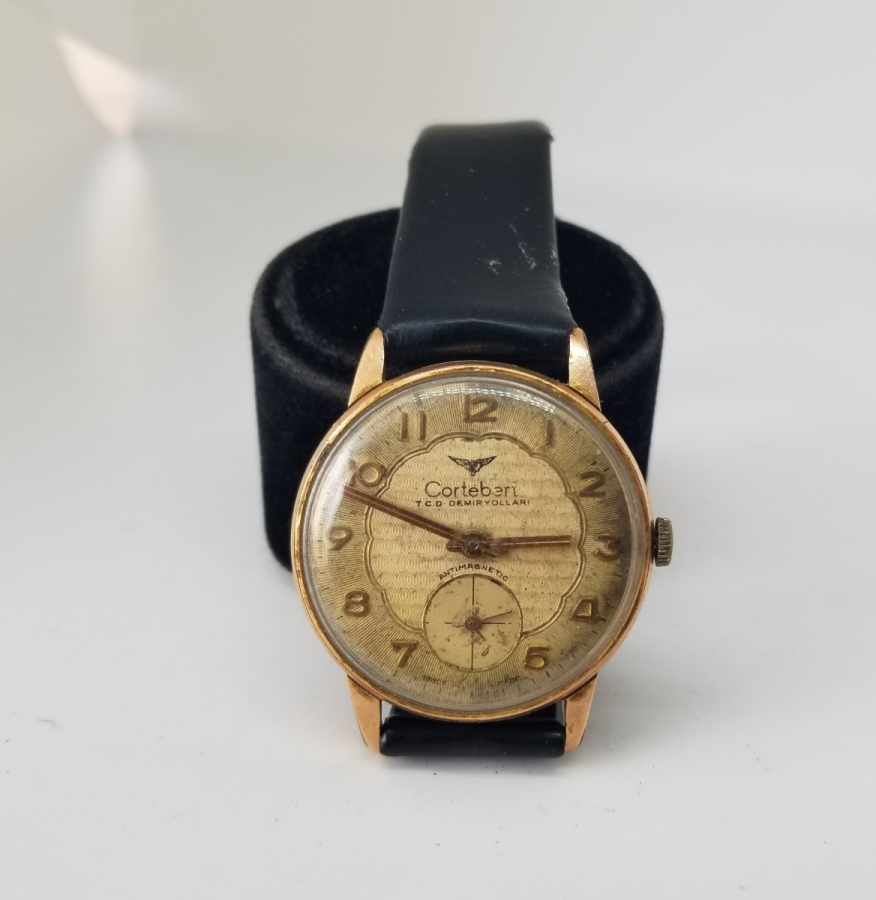 ALTIN KAPLAMA ANTİKA CORTEBERT KURMALI KOL SAATİ