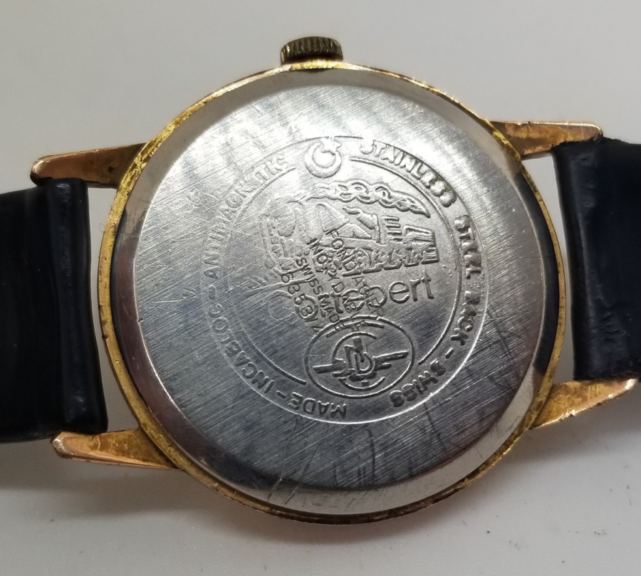 ALTIN KAPLAMA ANTİKA CORTEBERT KURMALI KOL SAATİ