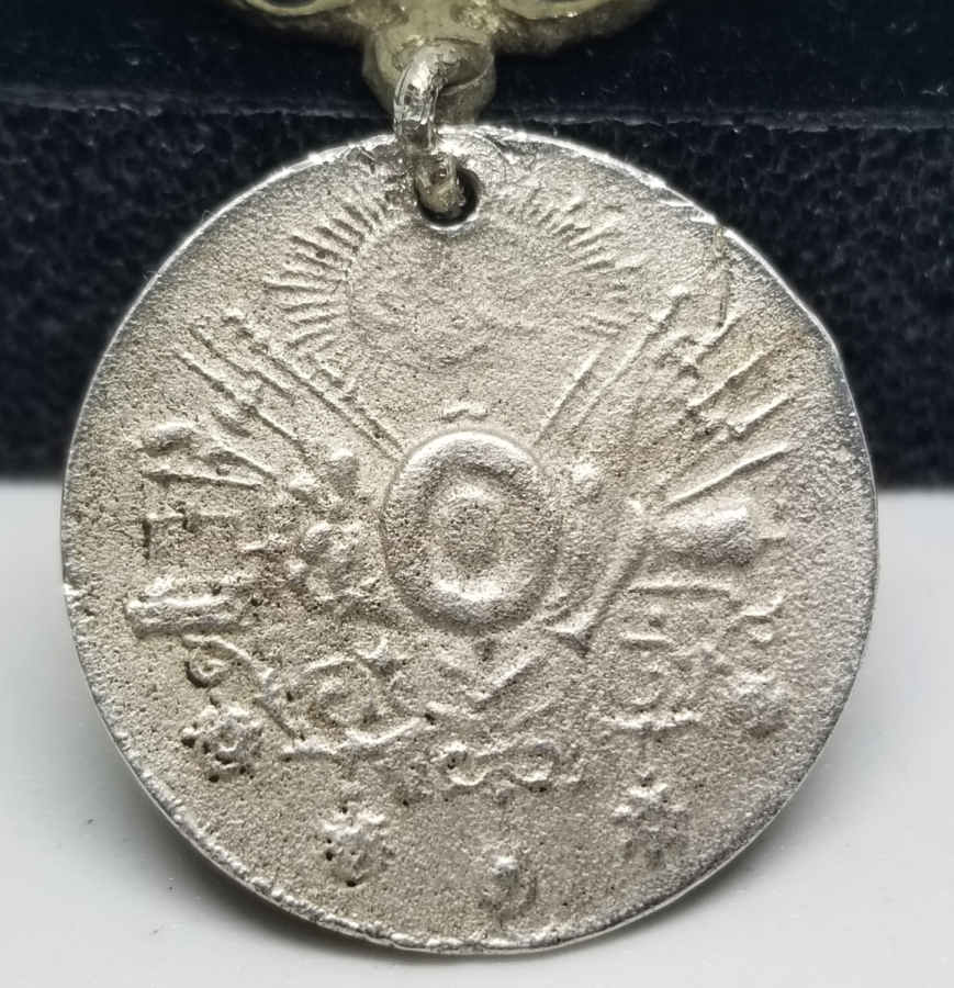 ORİJİNAL İPEK ASKISIYLA GÜMÜŞ LİYAKAT MADALYASI