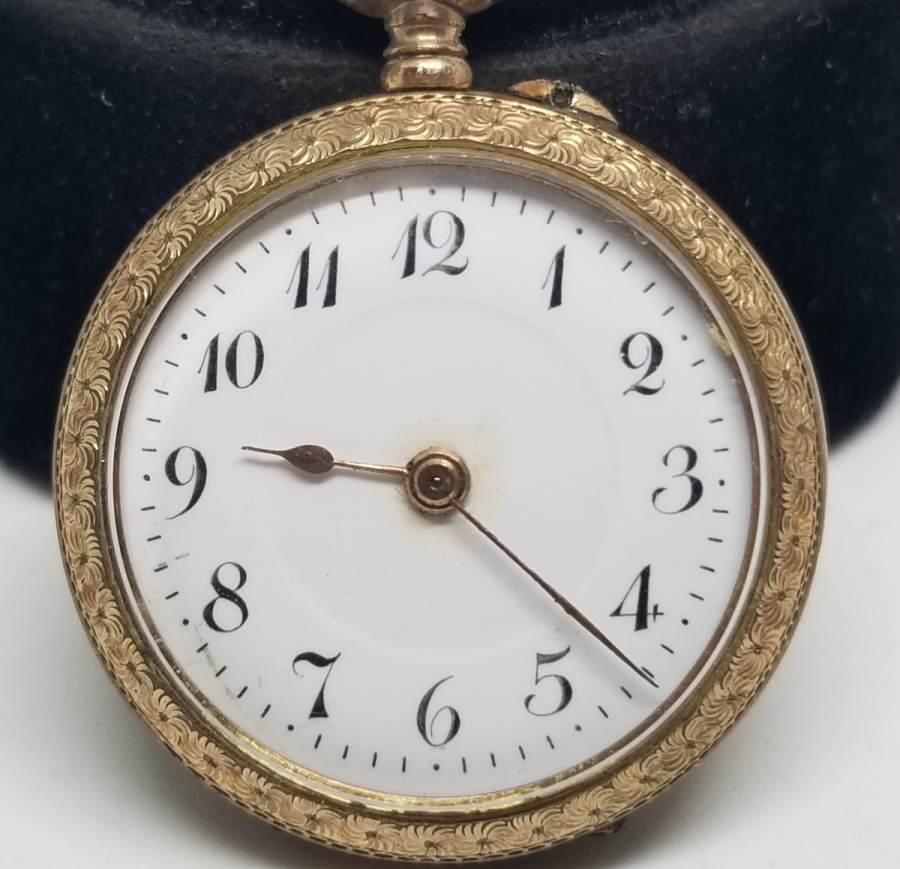 KABARTMA İŞÇİLİKLİ NADİR TİPTE ANTİKA ALTIN CEP SAATİ