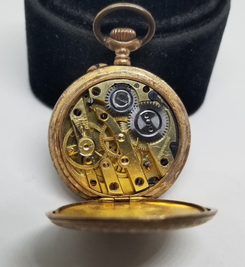 KABARTMA İŞÇİLİKLİ NADİR TİPTE ANTİKA ALTIN CEP SAATİ