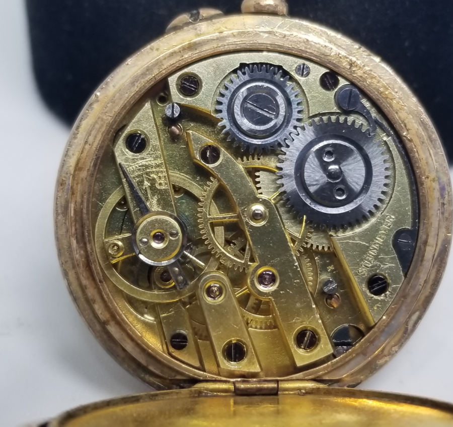 KABARTMA İŞÇİLİKLİ NADİR TİPTE ANTİKA ALTIN CEP SAATİ